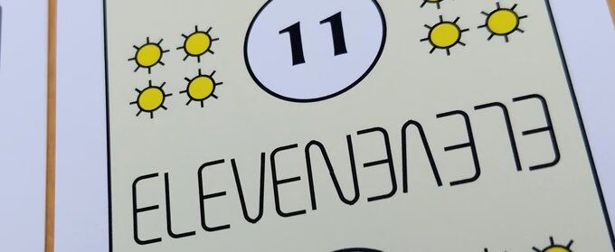 Close-up of the Yellow Eleven card